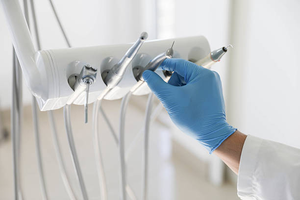 Professional Tooth Extraction technician working in Chula Vista, TX